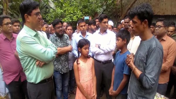 মধুখালীতে নির্যাতিত পিতা-পুত্রের পাশে জেলা প্রশাসক