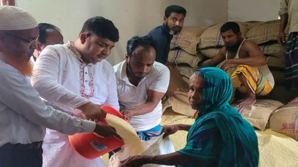 নগরকান্দার তালমায় ভিজিএফ এর চাল বিতরণ